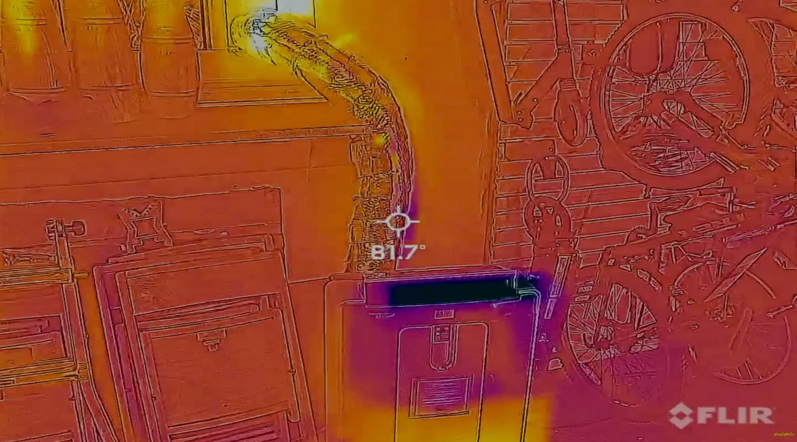 FLIR thermal image of portable AC exhaust duct after foil wrap insulation showing surface temperature of 80 to 82 degrees Fahrenheit