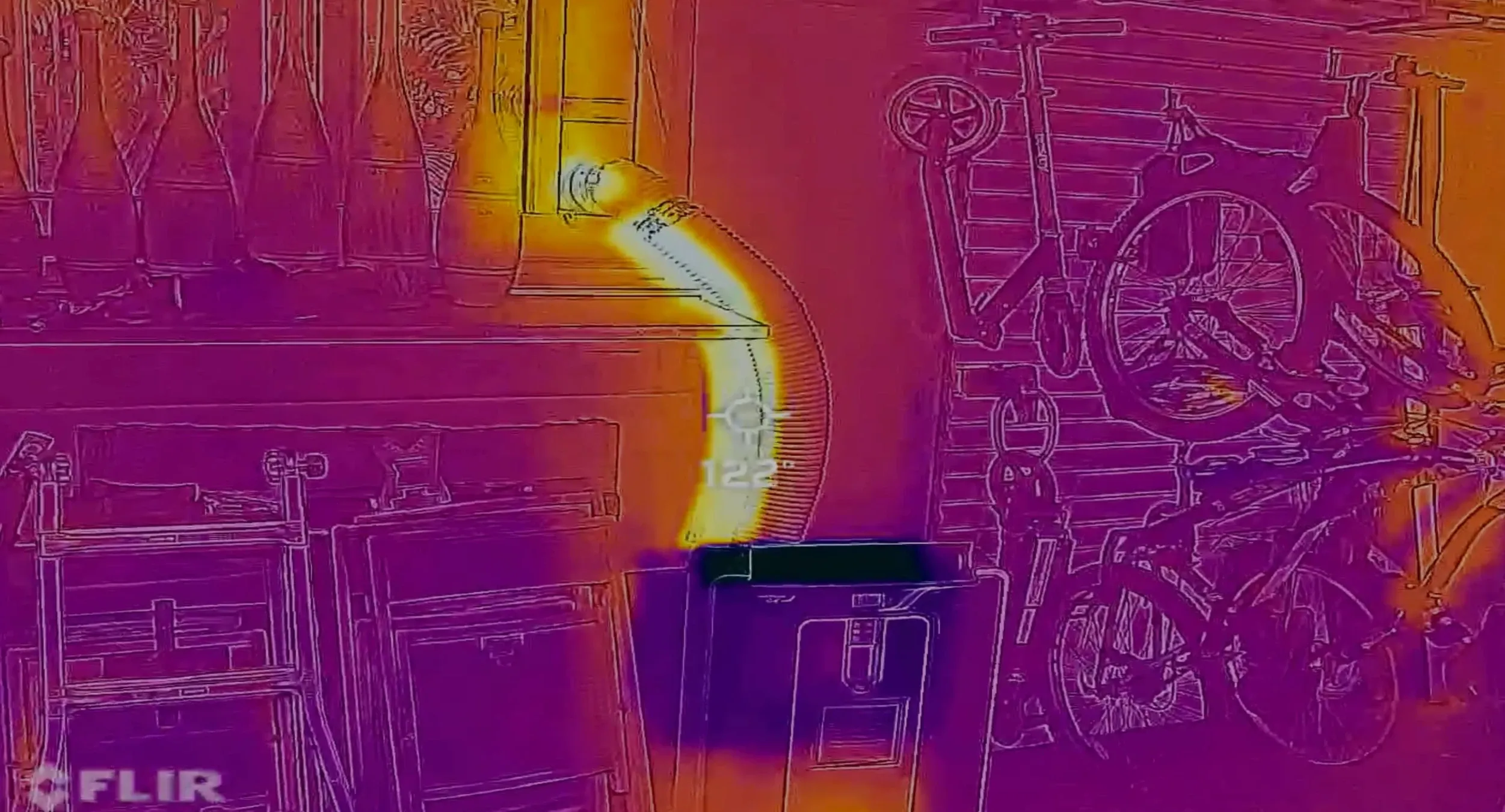 FLIR thermal image of uninsulated portable AC exhaust duct at approximately 120 degrees Fahrenheit