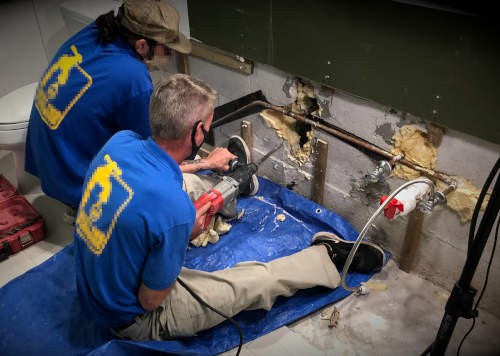 Plumbers finding the leak Plumbers finding the leak